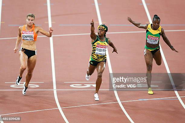 Shelly-Ann Fraser-Pryce of Jamaica beats Dafne Schippers of the Netherlands and Veronica Campbell-Brown of Jamaica to win gold in the Women's 100...