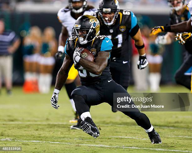 Runningback Bernard Pierce of the Jacksonville Jaguars on a running play during a preseason game against the Pittsburgh Steelers at EverBank Field on...