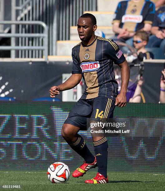 Defenseman Amobi Okugo of the Philadelphia Union dribbles the ball against Real Salt Lake on April 12, 2014 at PPL Park in Chester, Pennsylvania