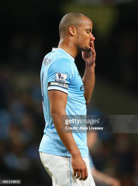 Vincent Kompany of Manchester City looks dejected during the Barclays Premier League match between Manchester City and Sunderland at Etihad Stadium...