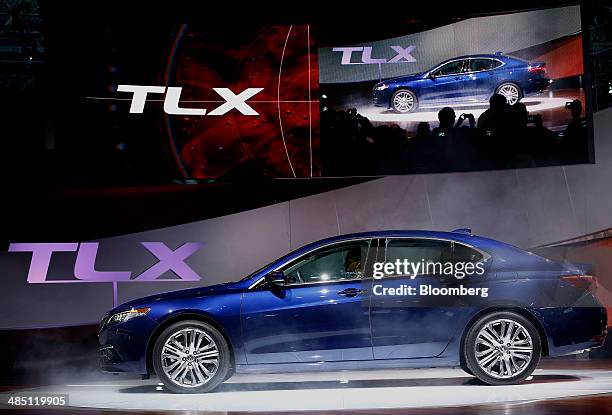 The 2015 Honda Motor Co. Acura TLX luxury sport sedan is unveiled during the 2014 New York Auto Show in New York, U.S., on Wednesday, April 16, 2014....