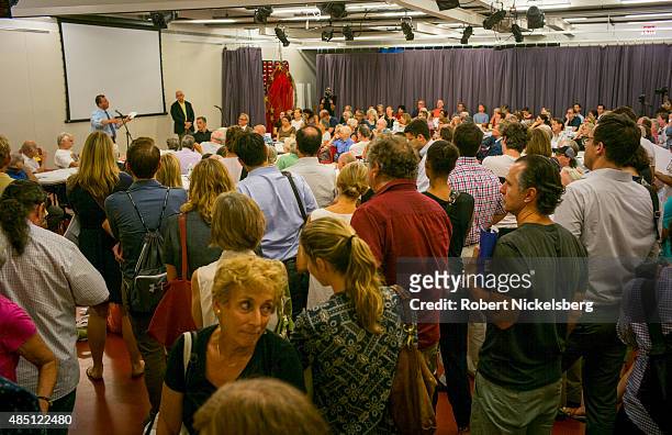 Residents of Cobble Hill, Carroll Gardens and Brooklyn Heights listen to speeches by local politicians during a community meeting August 6, 2015 to...