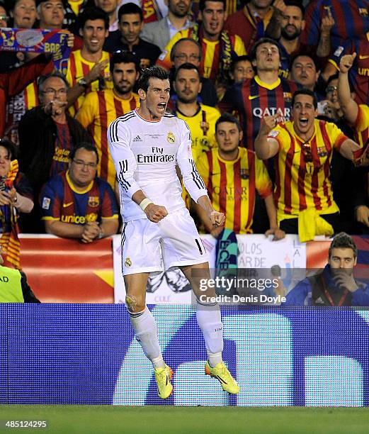 Gareth Bale of Real Madrid reacts after scoring Real's 2nd goal during the opa del Rey Final between Real Madrid and Barcelona at Estadio Mestalla on...