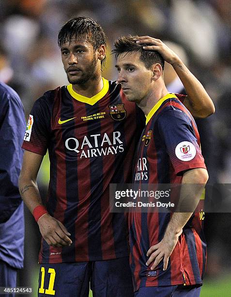 Lionel Messi and Neymar of FC Barcelona react after losing 2-1 to Real Madrid in the Copa del Rey Final between Real Madrid and Barcelona at Estadio...