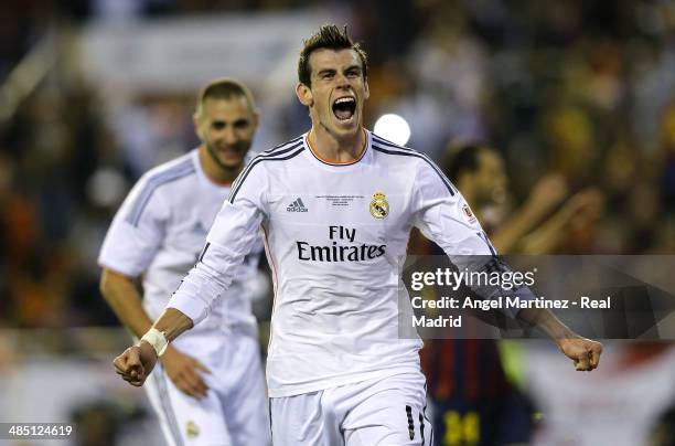 Gareth Bale of Real Madrid celebrates after scoring his team's second goal during the Copa del Rey Final between Real Madrid and Barcelona at Estadio...