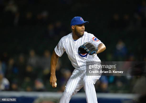 Relief pitcher Jose Veras of the Chicago Cubs delivers during the ninth inning against the Pittsburgh Pirates at Wrigley Field on April 8, 2014 in...