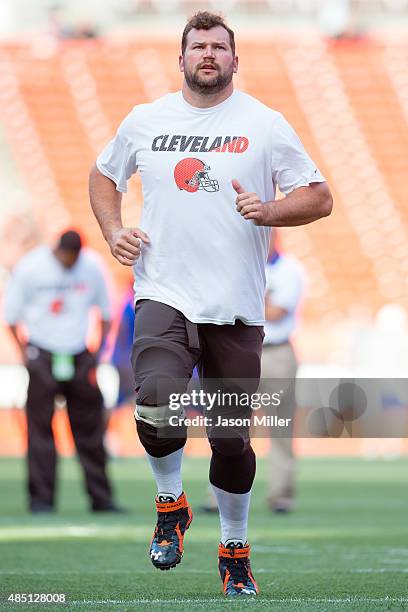 Tackle Joe Thomas of the Cleveland Browns warms up prior to a preseason game against the Buffalo Bills at FirstEnergy Stadium on August 20, 2015 in...