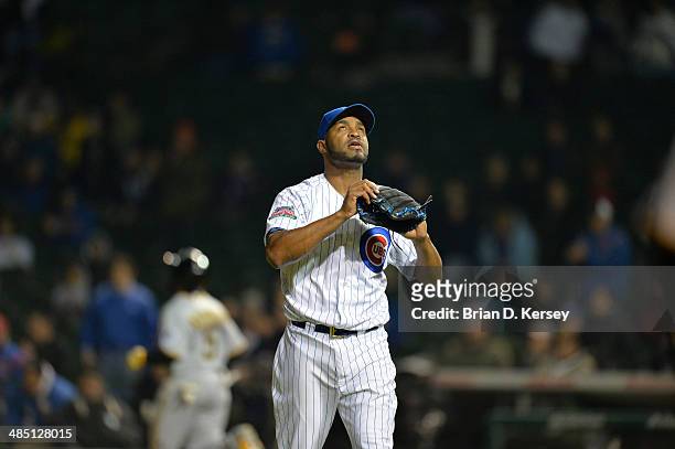 Relief pitcher Jose Veras of the Chicago Cubs walks off the mound during the ninth inning against the Pittsburgh Pirates at Wrigley Field on April 8,...