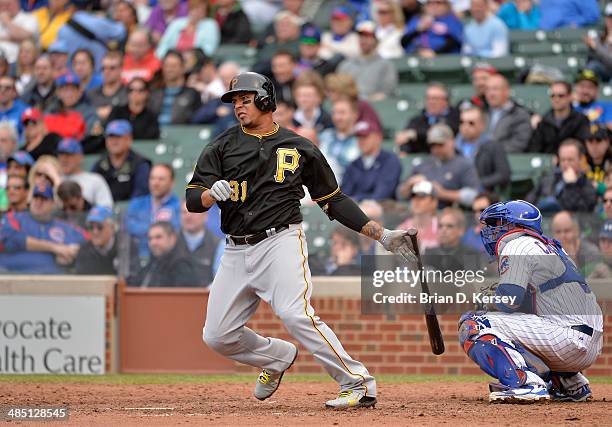 Jose Tabata of the Pittsburgh Pirates bats during the seventh inning against the Chicago Cubs at Wrigley Field on April 10, 2014 in Chicago,...