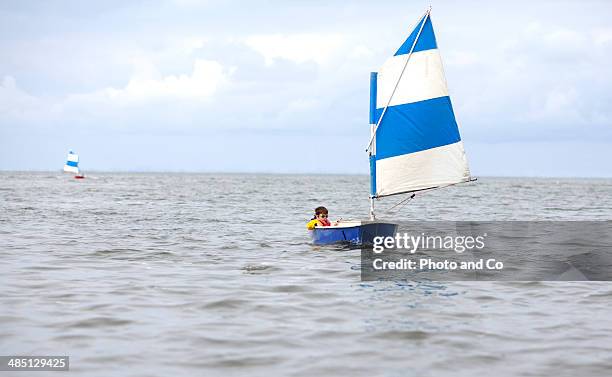 child sailing - kid sailing imagens e fotografias de stock