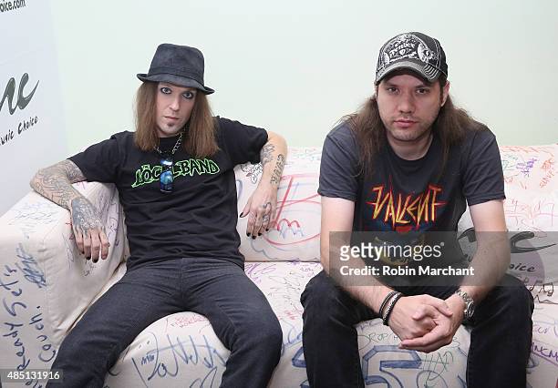 Alexi Laiho and Jannie Wirman of Rock Band Children Of Bodom visit at Music Choice on August 24, 2015 in New York City.