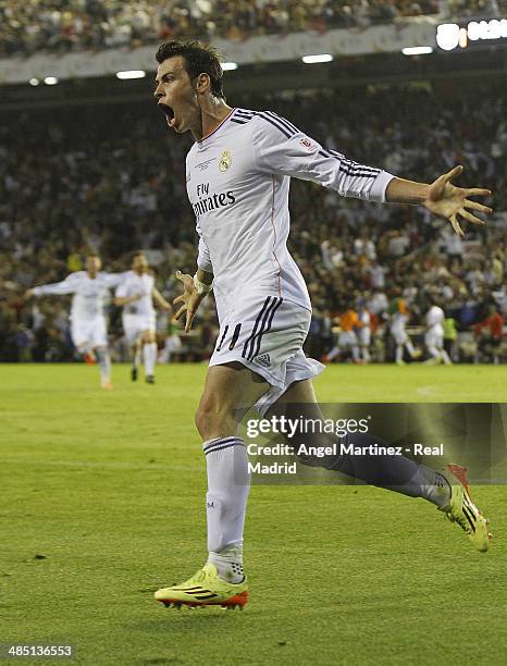 Gareth Bale of Real Madrid celebrates after scoring his team's second goal during the Copa del Rey Final between Real Madrid and Barcelona at Estadio...