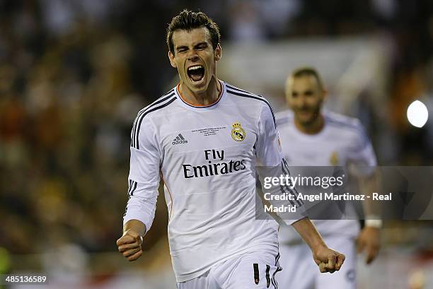 Gareth Bale of Real Madrid celebrates after scoring his team's second goal during the Copa del Rey Final between Real Madrid and Barcelona at Estadio...