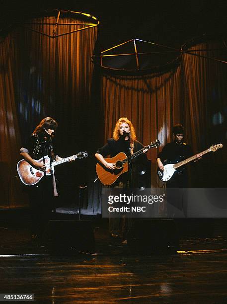Pictured: Amy Ray, Emily Sailers and Sara Lee of the musical group Indigo Girls perform on January 23, 1991 --