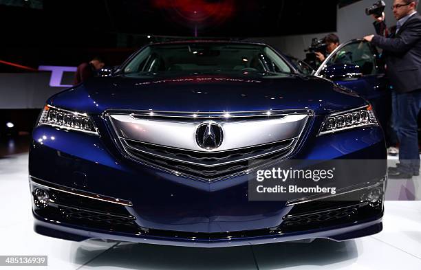 The 2015 Honda Motor Co. Acura TLX luxury sport sedan is displayed after the unveiling at the 2014 New York Auto Show in New York, U.S., on...