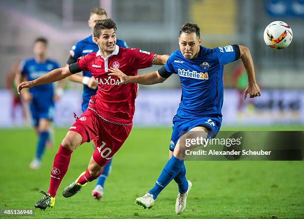 Antonio Colak of 1. FC Kaiserslautern challenges Florian Ruck of SC Paderborn during the second Bundesliga match between 1. FC Kaiserslautern and SC...