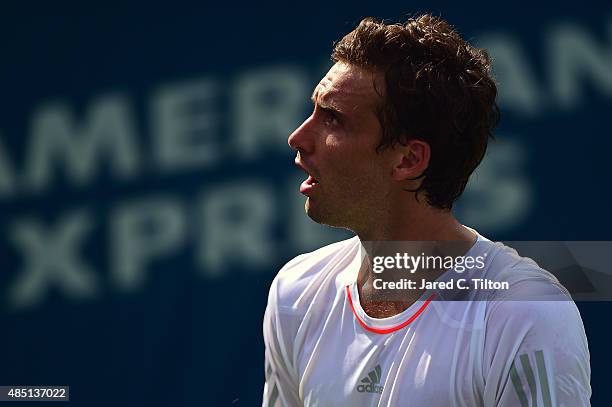 Ernests Gulbis of Latvia looks to the stands during the first day of the Winston-Salem Open at Wake Forest University on August 24, 2015 in...