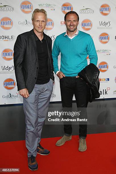 Carsten Ramelow and Jens Nowotny attend the 'RTL - Wir helfen Kindern' Golf Charity 2015 reception on August 24, 2015 in Gummersbach, Germany.