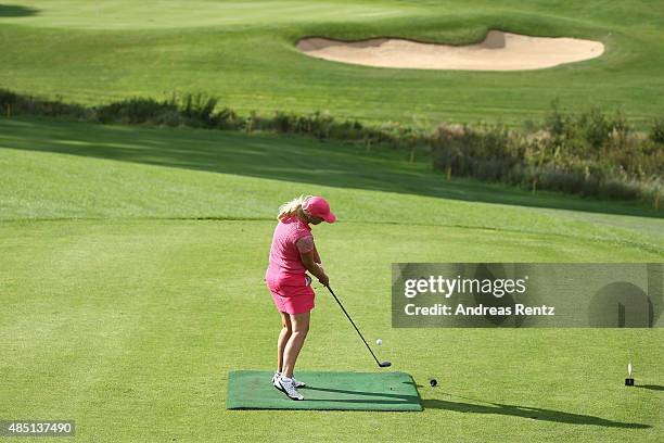 Heike Wontorra hits a tee shot during the 'RTL - Wir helfen Kindern' Golf Charity 2015 tournament at Golf Club Oberberg on August 24, 2015 in...