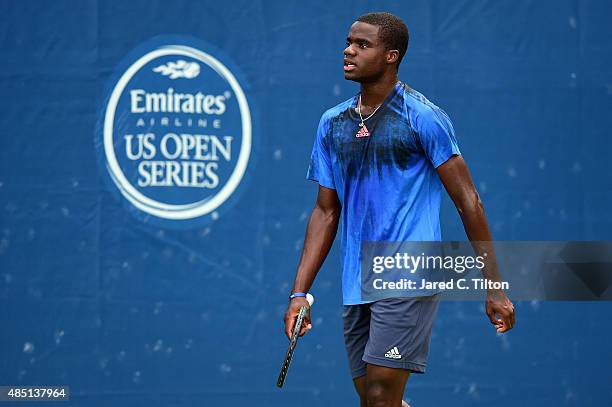 Frances Tiafoe looks on during his match against James Duckworth of Australia during the first day of the Winston-Salem Open at Wake Forest...