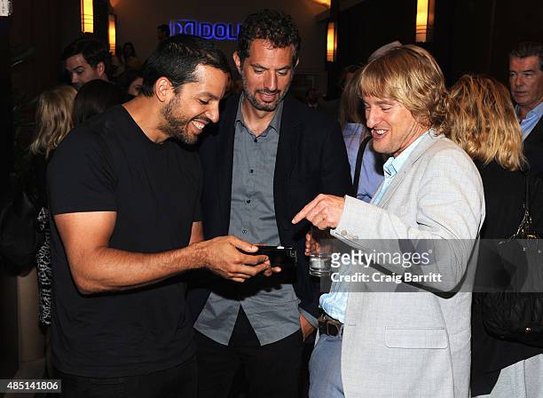 David Blaine, Guy Oseary and Owen Wilson attend the special screening of NO ESCAPE with Owen Wilson, Lake Bell and Pierce Brosnan at Dolby 88 Theater...