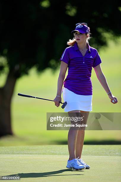 Paula Creamer of the USA prepares to putt on the 4th hole during the first round of the LPGA LOTTE Championship Presented by J Golf on April 16, 2014...