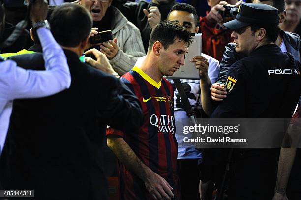 Lionel Messi of FC Barcelona looks down after being defeated during the Copa del Rey Final between Real Madrid and FC Barcelona at Estadio Mestalla...