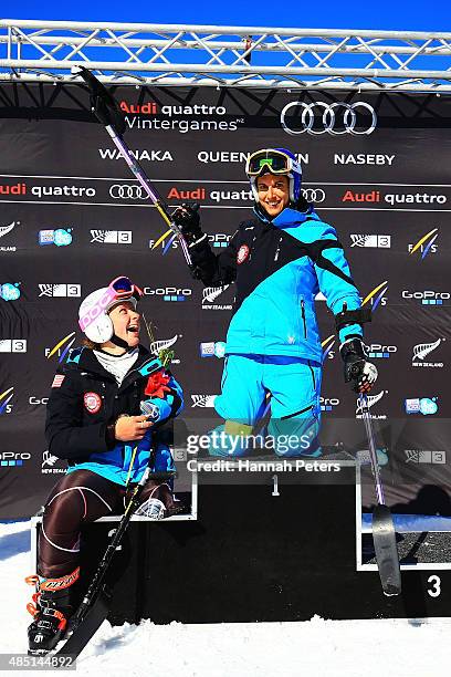 Second place Stephanie Jallen of the United States and first place Melanie Schwartz of the United States pose during the flower ceremony for the...