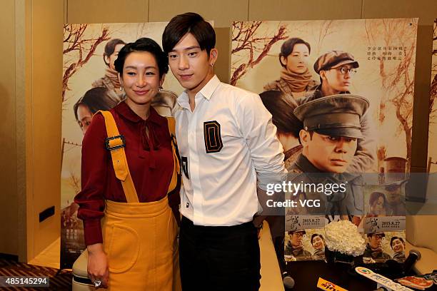 Actor Jing Boran and actress Qin Hailu attend premiere of director Mabel Cheung's new film "Tale of Three Cities" on August 24, 2015 in Shenyang,...