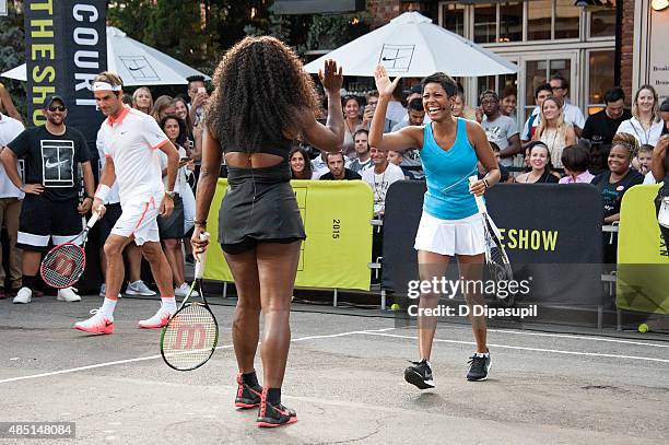 Tamron Hall, Serena Williams, and Roger Federer attend Nike's "NYC Street Tennis" event on August 24, 2015 in New York City.