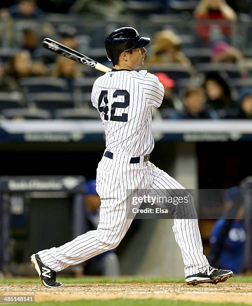 Scott Sizemore of the New York Yankees gets a hit in the fifth inning against the Chicago Cubs during game two of a doubleheader on April 16, 2014 at...