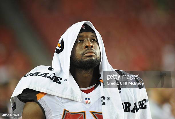 Defensive tackle Gerald McCoy of the Tampa Bay Buccaneers watches the action on the sideline in the second half against the Cincinnati Bengals at...