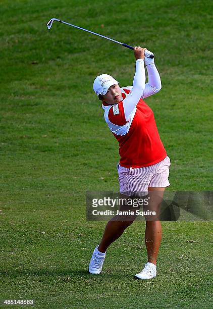 Shanshan Feng of China hits her second shot on the 18th hole during the first round of the LPGA LOTTE Championship Presented by J Golf on April 16,...