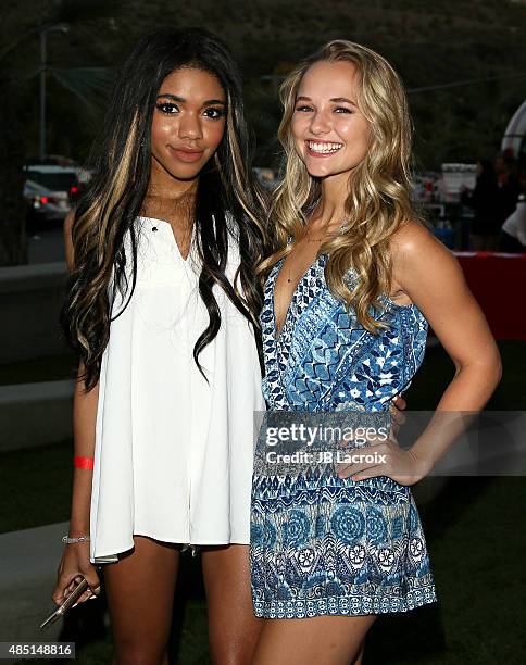 Teala Dunn and Madison Iseman attend the screening of 'How To Survive High School' on August 24, 2015 in Los Angeles, California.