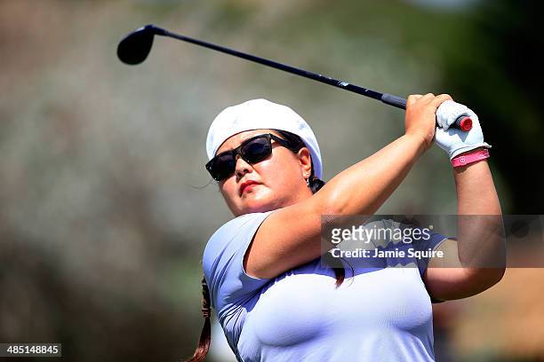 Christina Kim hits her tee shot on the 18th hole during the first round of the LPGA LOTTE Championship Presented by J Golf on April 16, 2014 in...
