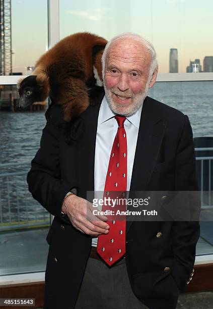 Philanthropist Jim Simons poses for a photo with a lemur from Madagascar at the Stars of Stony Brook Gala 2014 at Chelsea Piers on April 16, 2014 in...