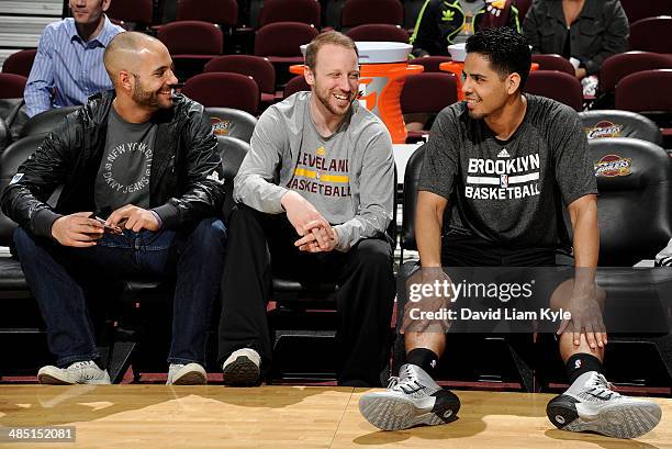 Assistant coach Jordi Fernandez and head coach Steve Hetzel of the NBDL Canton Charge talk with their former player and current Brooklyn Nets point...