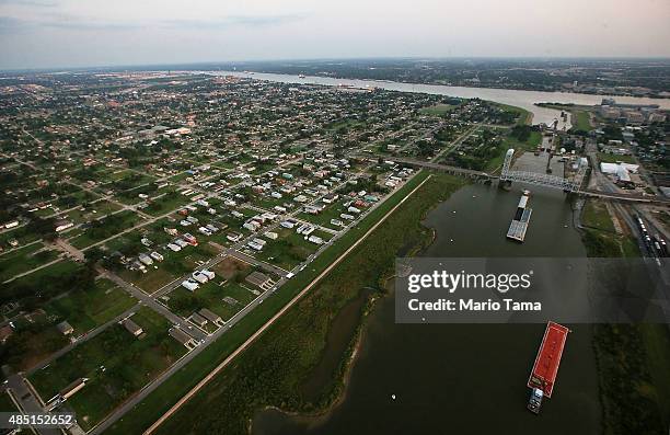 Homes and vacant lots stand in the Lower Ninth Ward in front of the Industrial Canal on August 24, 2015 in New Orleans, Louisiana. The area was one...