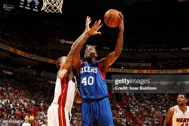 Jarvis Varnado of the Philadelphia 76ers shoots against the Miami Heat at the American Airlines Arena in Miami, Florida on April 16, 2014. NOTE TO...