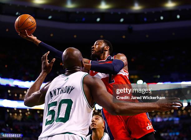 John Wall of the Washington Wizards goes up for a layup in front of Joel Anthony of the Boston Celtics in the second half during the game at TD...