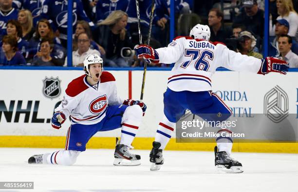 Dale Weise of the Montreal Canadiens celebrates his game-winning goal in overtime with P.K. Subban against the Tampa Bay Lightning in Game One of the...