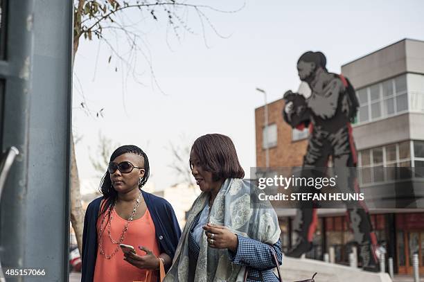 Makaziwe Mandela and another member of the Mandela family arrive at the Johannesburg Magistrates Court on August 25, 2015 for the bail application of...