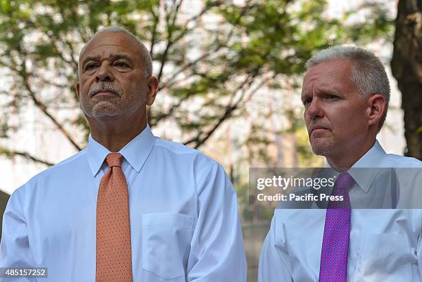General Manager Michael Kelly and City Council Majority Leader Jimmy Van Bramer listen as Mayor Bill de Blasio makes his opening comments at the...