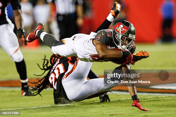 Wide Receiver Russell Shepard of the Tampa Bay Buccaneers makes a driving catch over Cornerback Reggie Nelson of the Cincinnati Bengals during a...