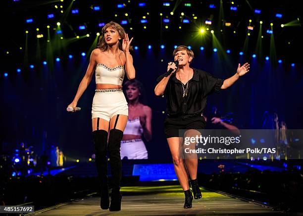 Singer-songwriters Taylor Swift and Natalie Maines of the band Dixie Chicks perform onstage during Taylor Swift The 1989 World Tour Live In Los...