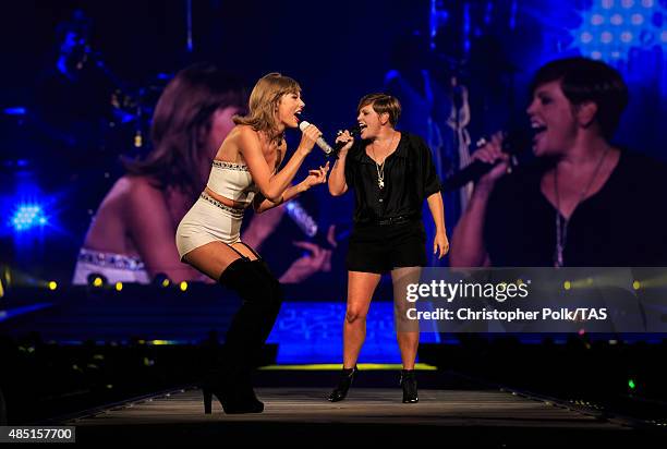 Singer-songwriters Taylor Swift and Natalie Maines of the band Dixie Chicks perform onstage during Taylor Swift The 1989 World Tour Live In Los...