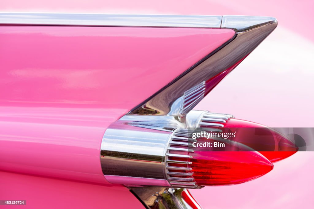 Tail Fin of 1959 Pink Cadillac de Ville Classic Car