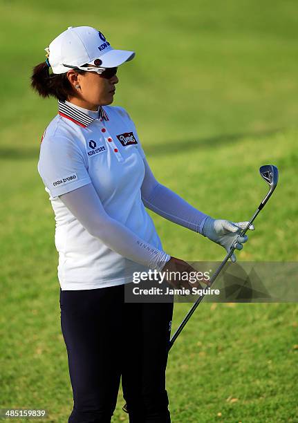 Se Ri Pak of Korea watches as her chip rolls in for an eagle on the 5th hole during the first round of the LPGA LOTTE Championship Presented by J...