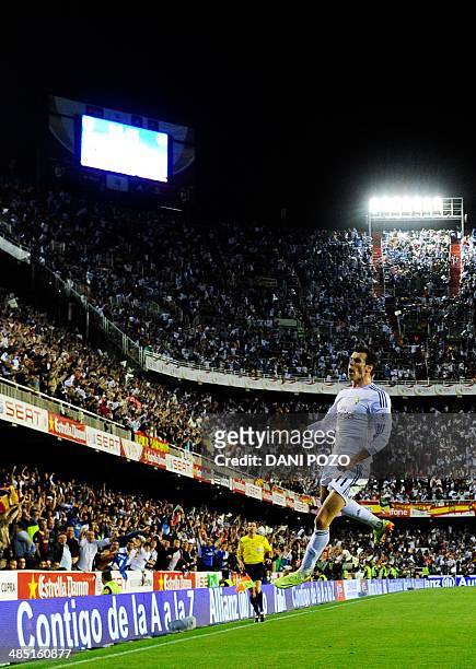 Real Madrid's Welsh forward Gareth Bale celebrates his goal during the Spanish Copa del Rey final "Clasico" football match FC Barcelona vs Real...