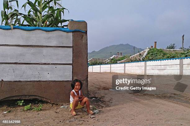 Kids go to school in the morning on August 20, 2015 in Tumangang, North Korea. North and South Korea today came to an agreement to ease tensions...